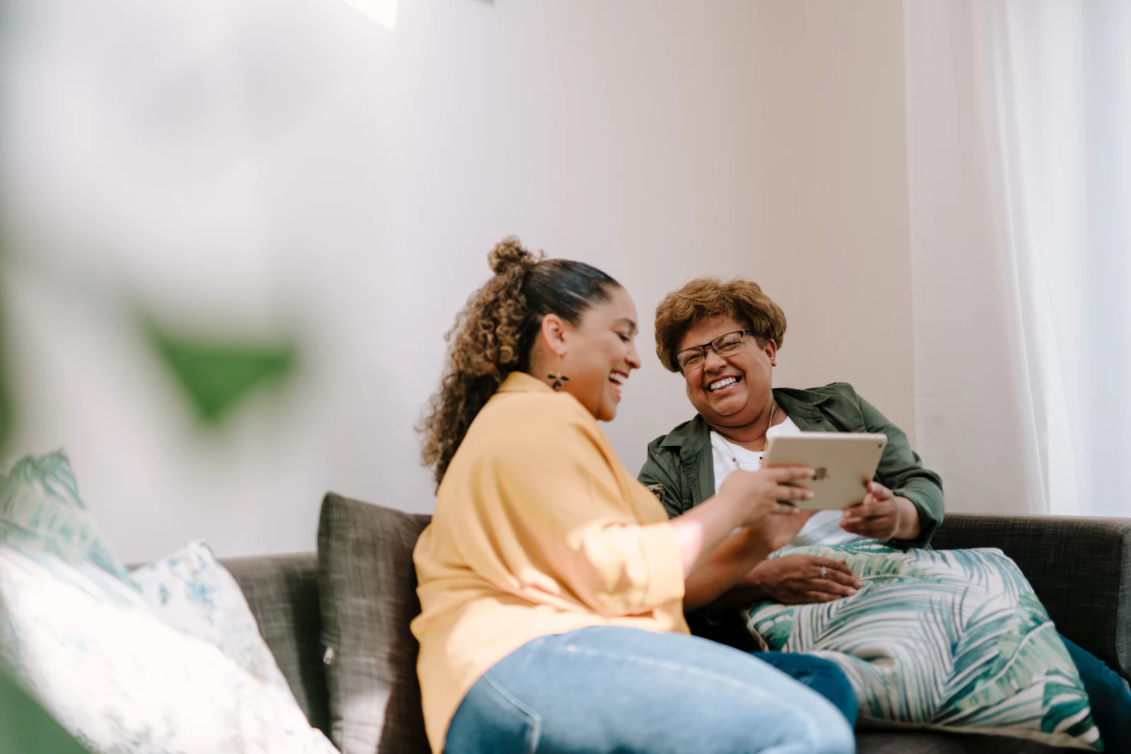 Two women talking together during a supportive session